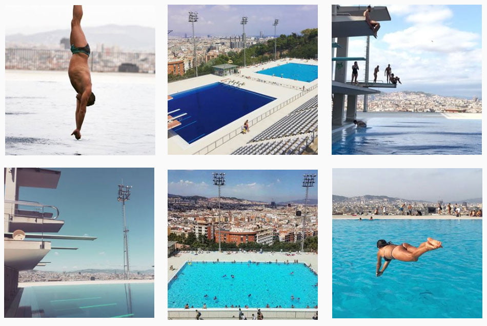Olympic swimming pool Barcelona - howcasing its iconic diving platforms and stunning city backdrop